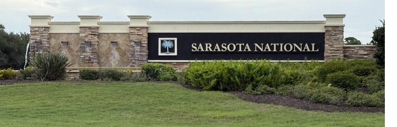 Sarasota National gated golf community entrance sign in Venice, Florida